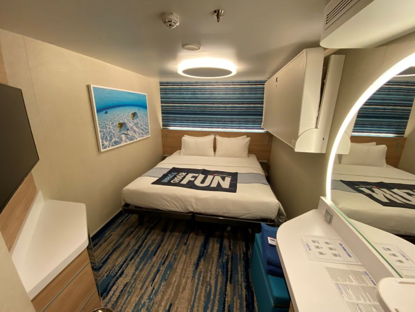 Compact inside cruise cabin with smart storage
